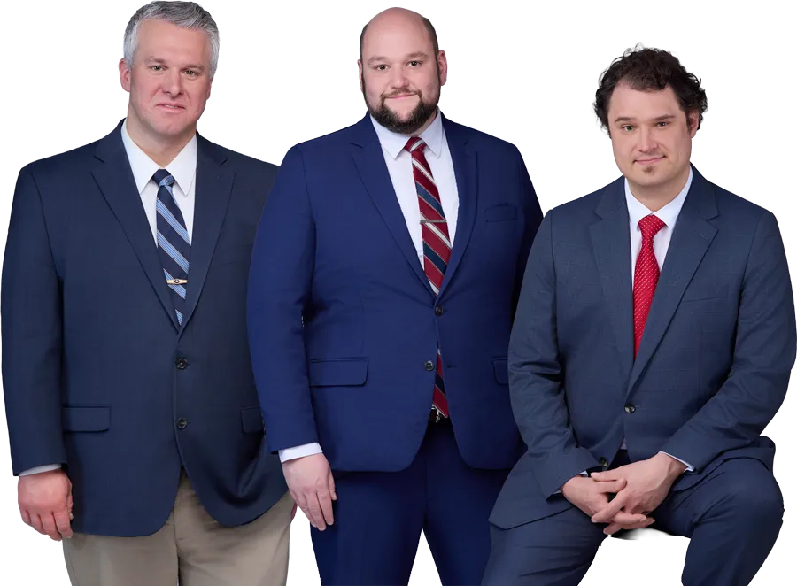 Attorneys Lyndon Small, Eric K. Doyle, and Andrew Barton